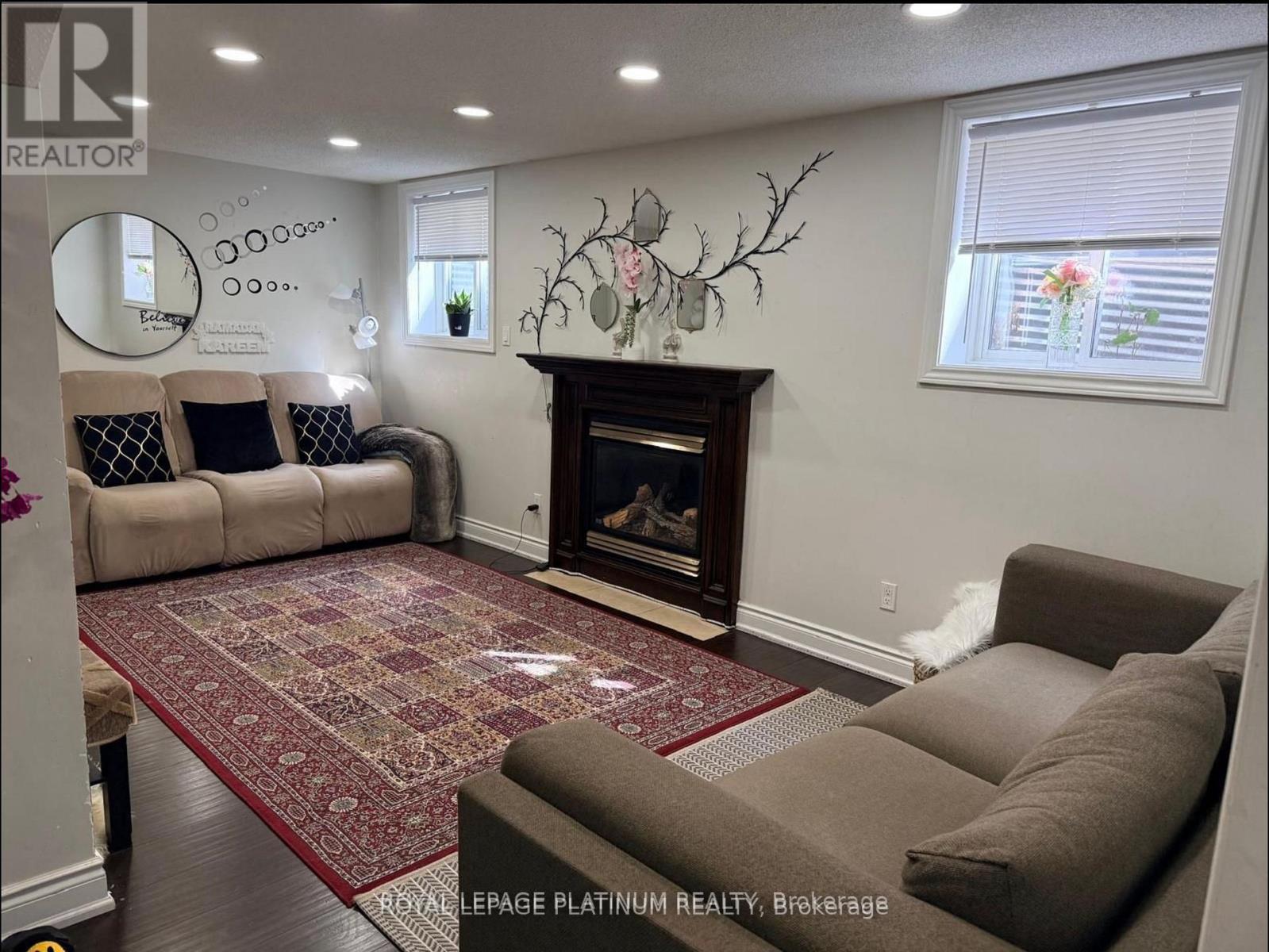 Legal Basement - 1540 Manorbrook Court, Mississauga, ON - Indoor Photo Showing Living Room With Fireplace