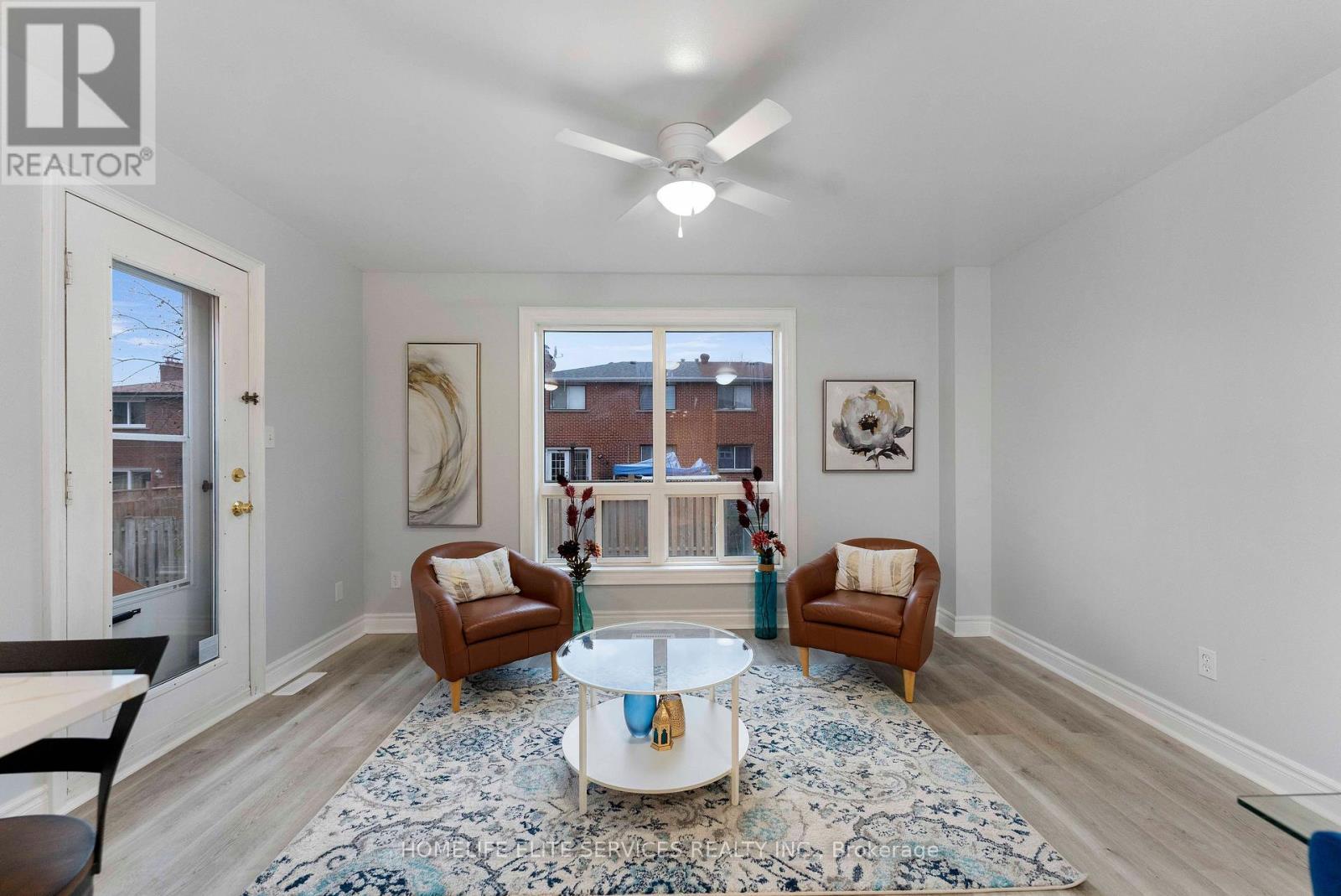 Separate Main floor Family Room - 5 Lenthall Avenue, Toronto, ON - Indoor Photo Showing Living Room