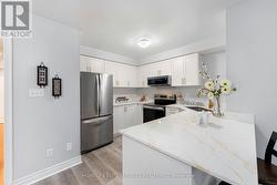 New Kitchen w/ SS Appliances & Quartz Counters -