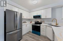 Brand new Kitchen Cabinets with Gold Finishes. -