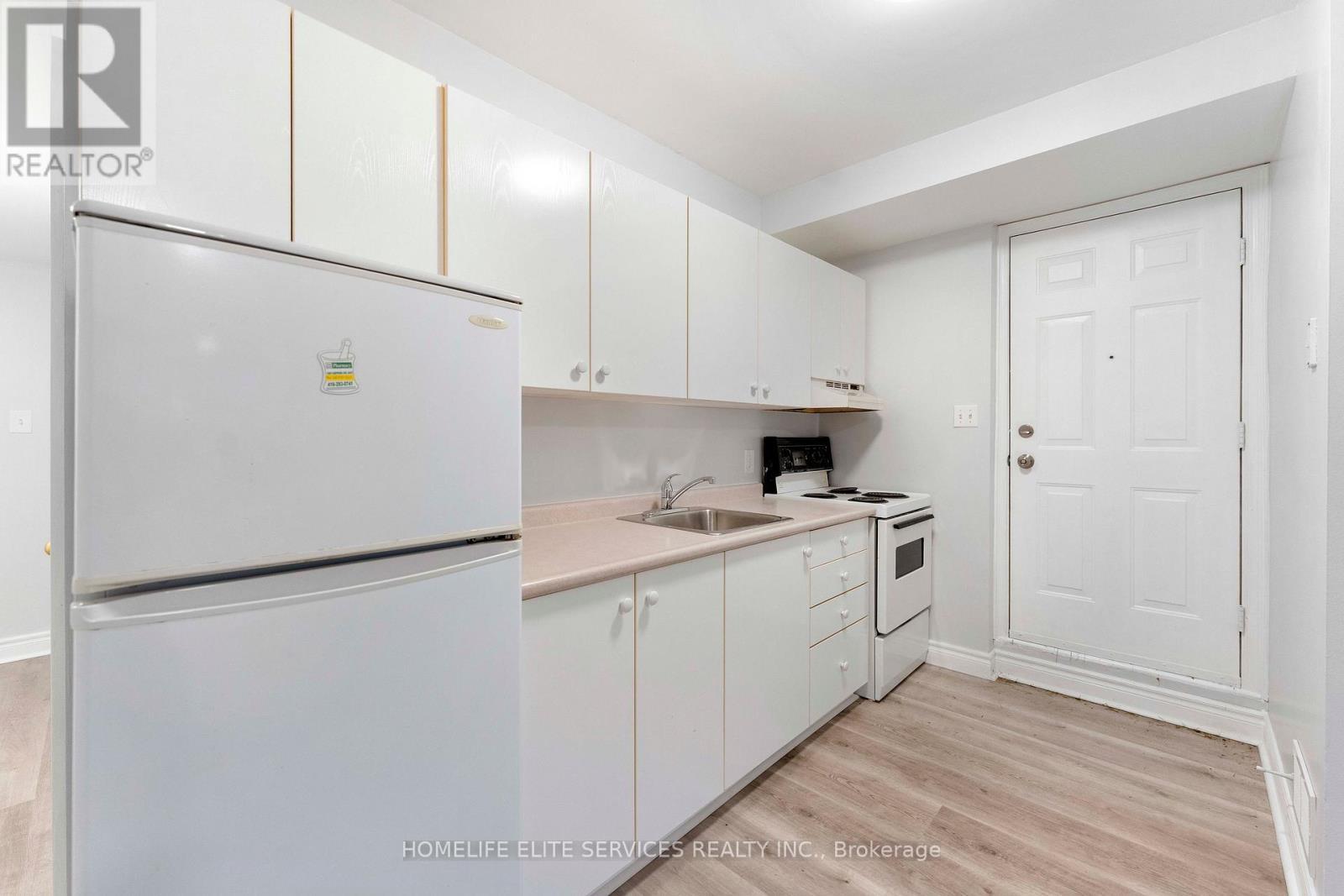 Separate side entrance to the Basement - 5 Lenthall Avenue, Toronto, ON - Indoor Photo Showing Kitchen