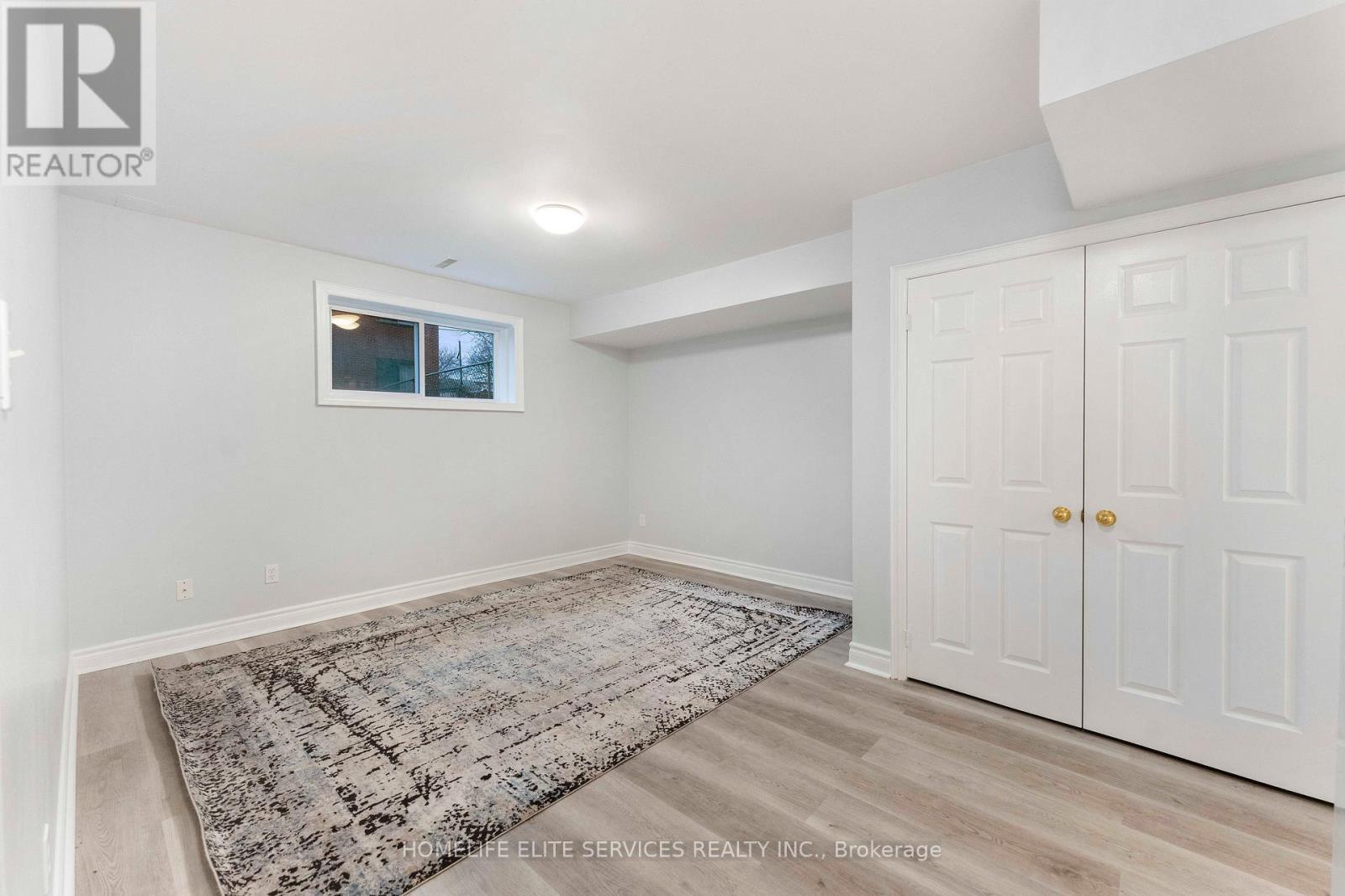 Basement Living & Dining Room with Large window - 5 Lenthall Avenue, Toronto, ON - Indoor Photo Showing Other Room