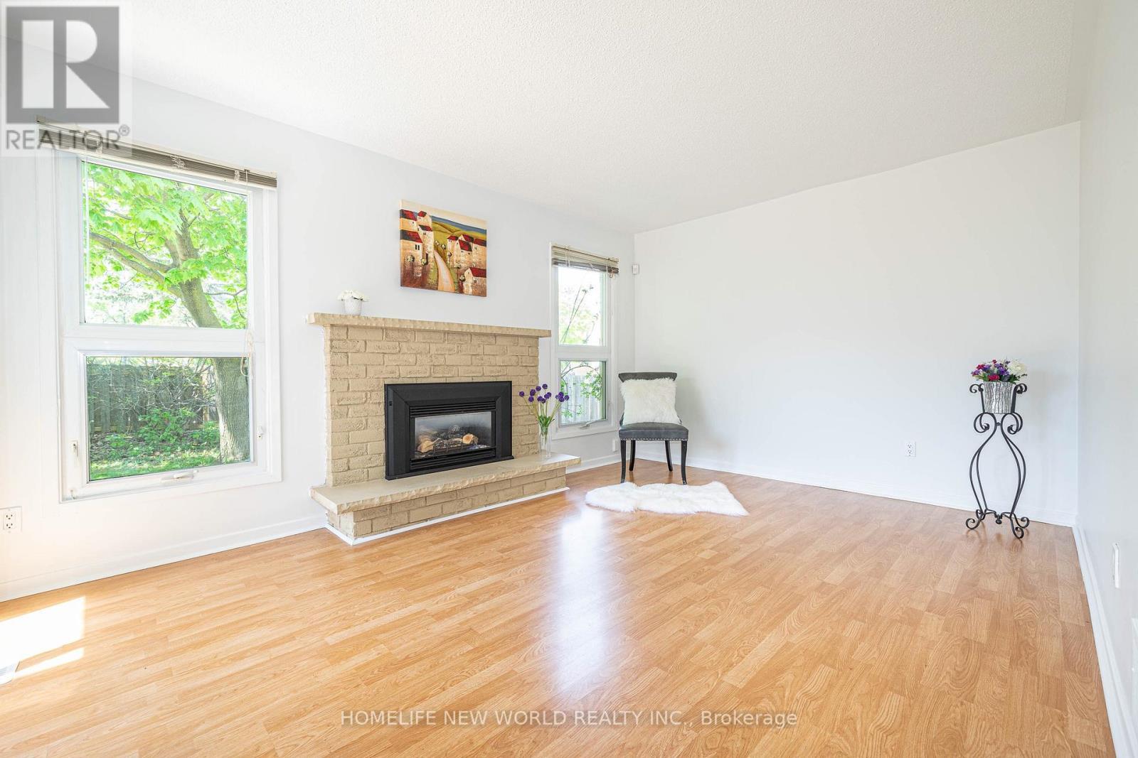 96 Port Royal Trail, Toronto, ON - Indoor Photo Showing Living Room With Fireplace