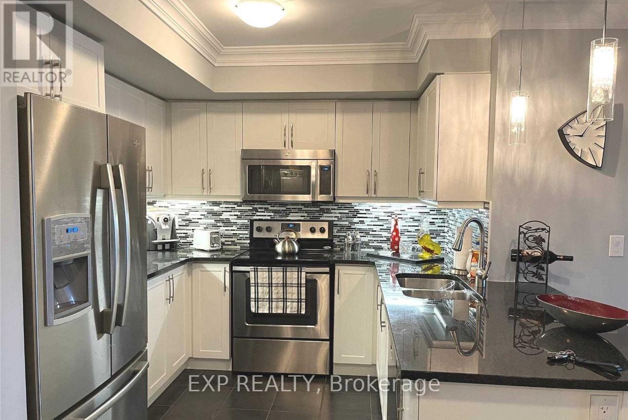 205 - 60 Baycliffe Crescent, Brampton, ON - Indoor Photo Showing Kitchen With Double Sink With Upgraded Kitchen