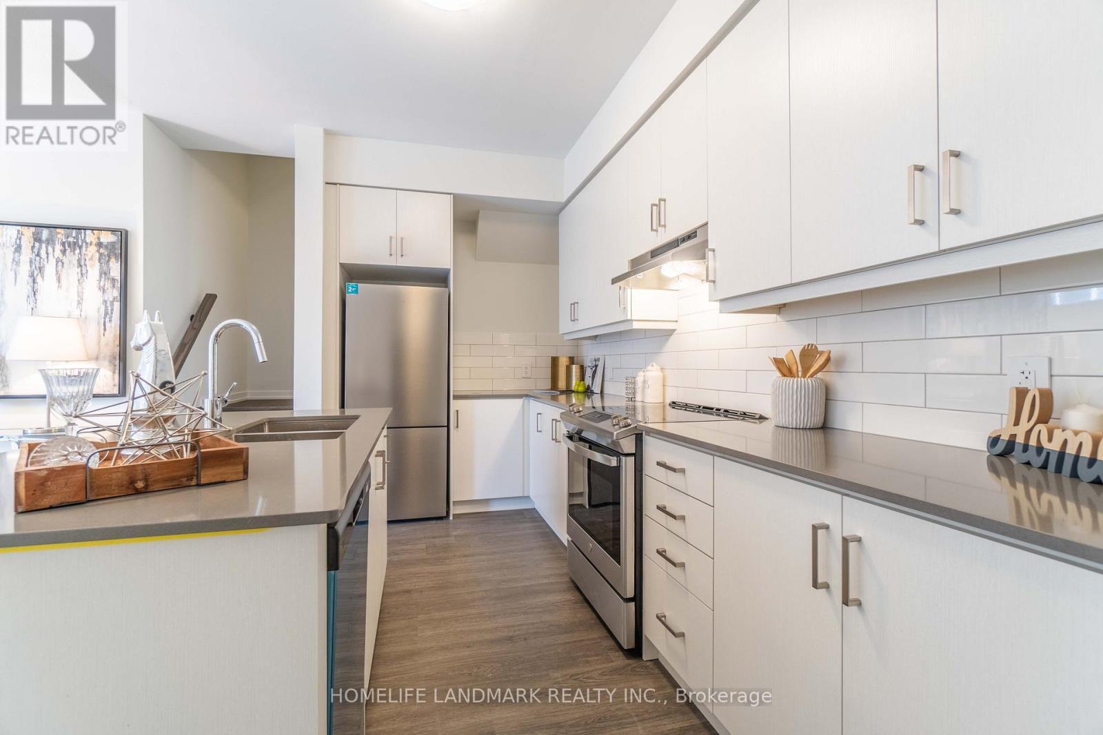 109 - 10 Almond Blossom Mews, Vaughan, ON - Indoor Photo Showing Kitchen With Stainless Steel Kitchen With Double Sink With Upgraded Kitchen