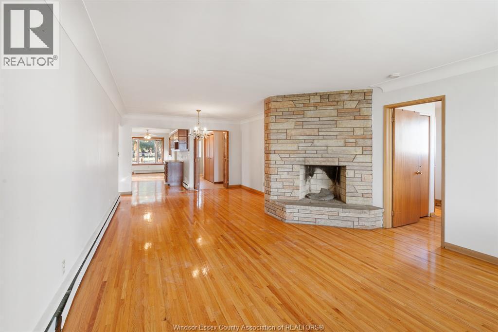 13918 Riverside Drive East, Tecumseh, ON - Indoor Photo Showing Living Room With Fireplace