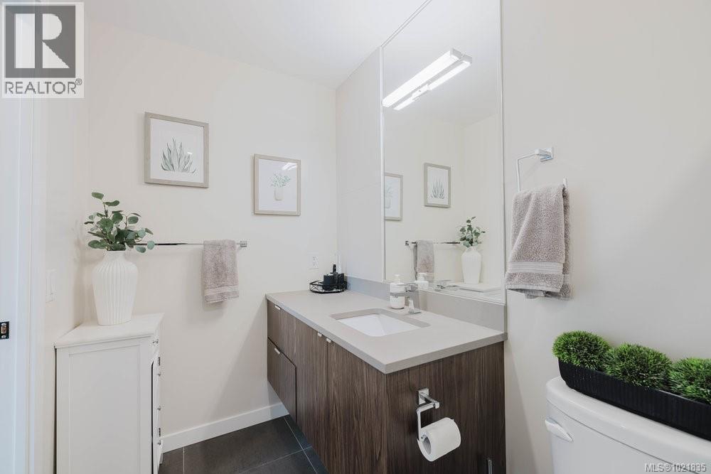 Bathroom featuring toilet and vanity - 210 881 Short St, Saanich, BC - Indoor Photo Showing Bathroom