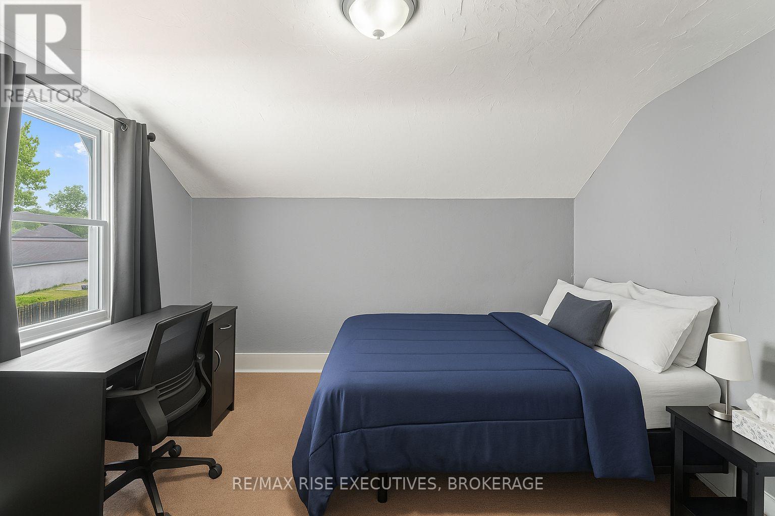 Virtually Staged - 135 Nelson Street, Kingston (Central City East), ON - Indoor Photo Showing Bedroom