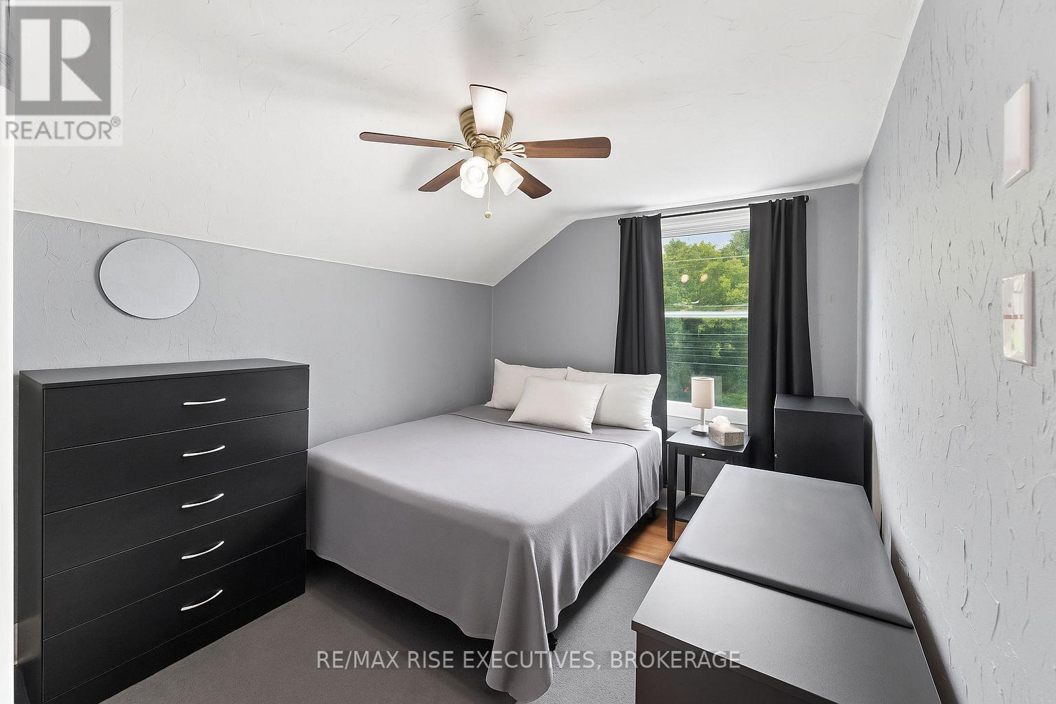 Virtually Staged - 135 Nelson Street, Kingston (Central City East), ON - Indoor Photo Showing Bedroom