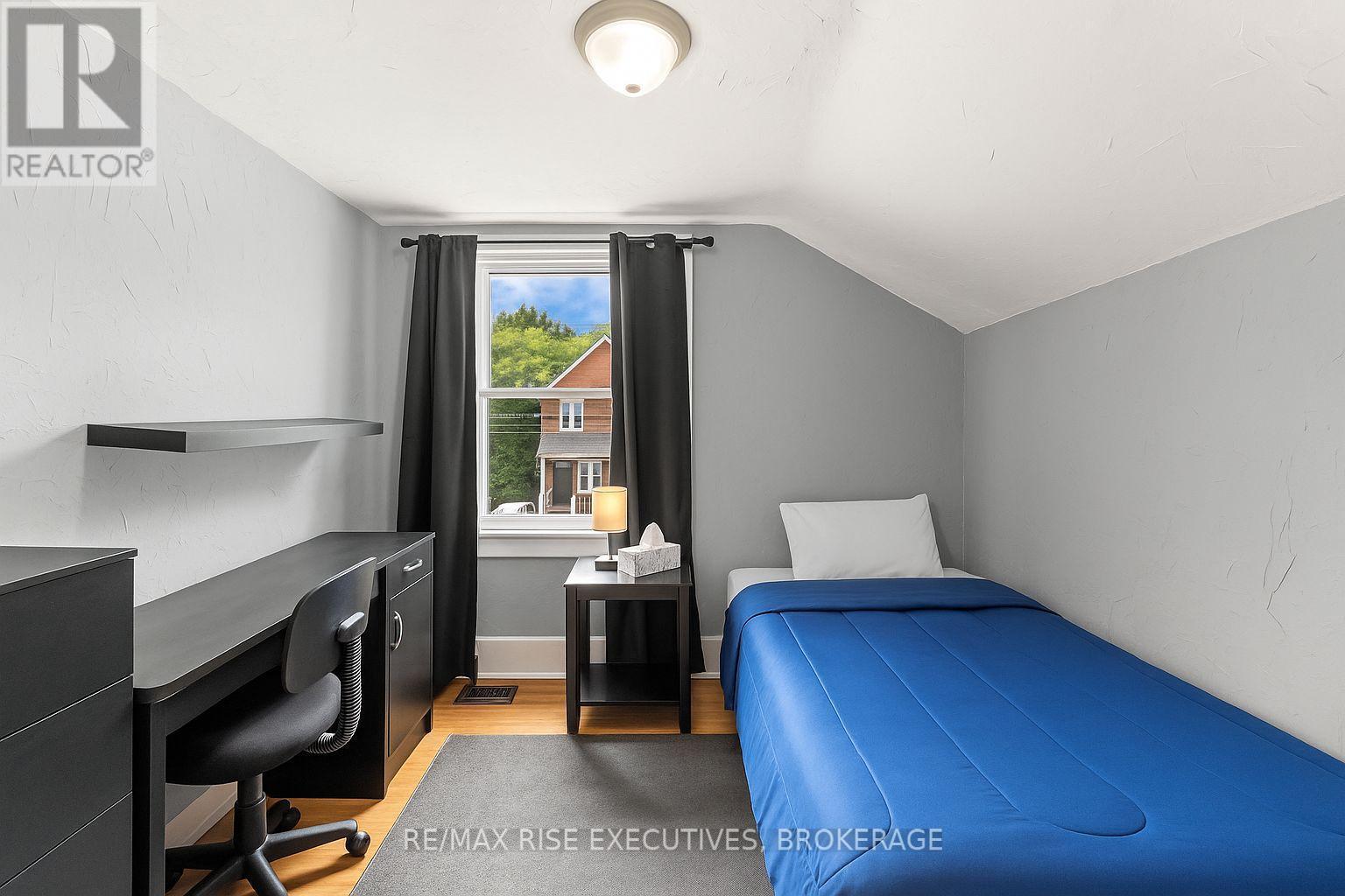 Virtually Staged - 135 Nelson Street, Kingston (Central City East), ON - Indoor Photo Showing Bedroom