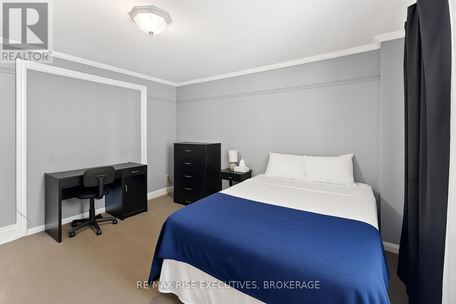 Virtually Staged - 135 Nelson Street, Kingston (Central City East), ON - Indoor Photo Showing Bedroom