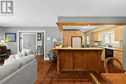 Open kitchen affords seamless connection. -