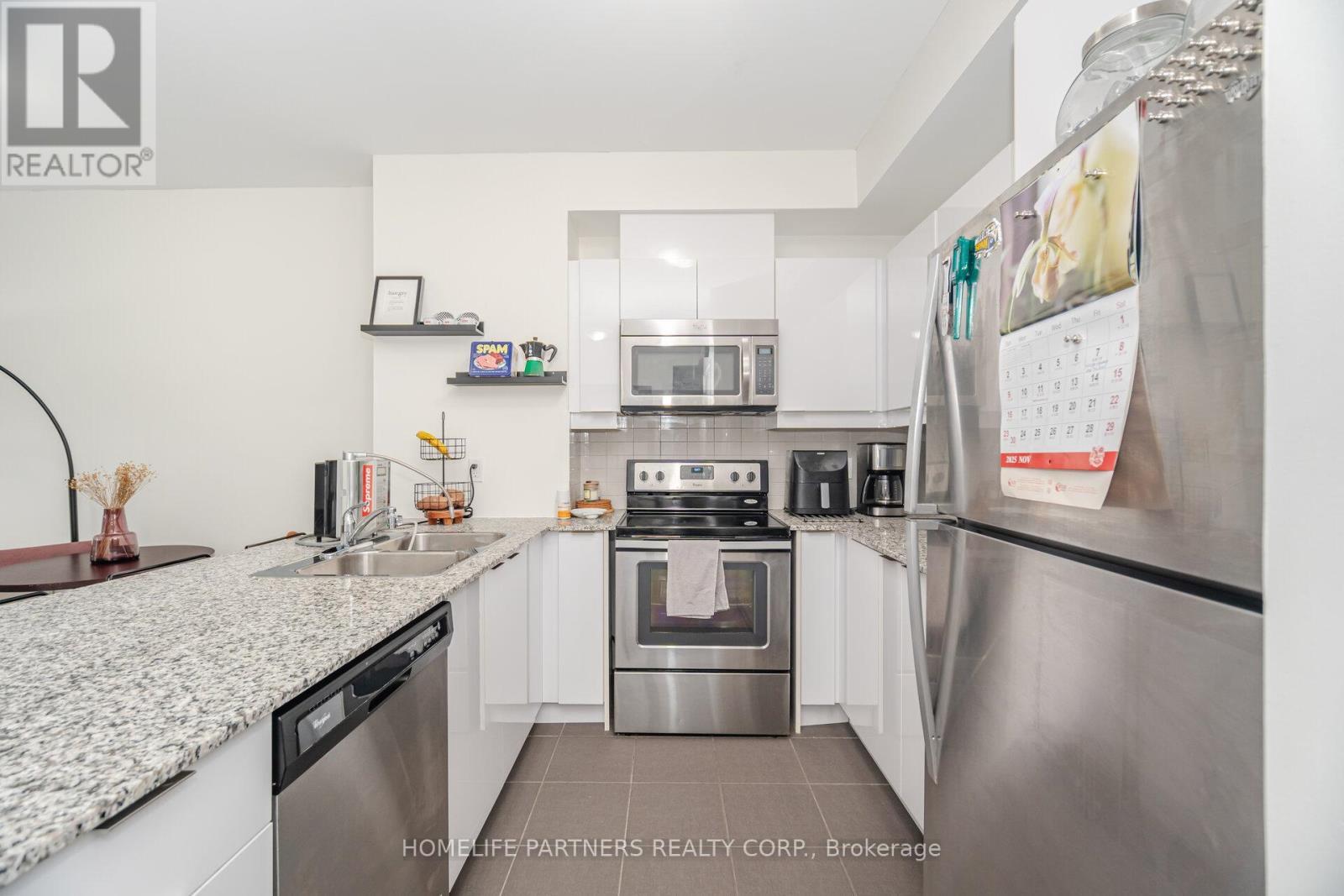 1006 - 2910 Highway 7 Road W, Vaughan, ON - Indoor Photo Showing Kitchen With Stainless Steel Kitchen With Double Sink