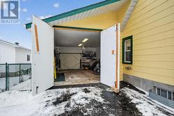 Note the second garage door to back yard -