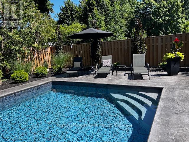 73 Mcleod Crescent, London North (North H), ON - Outdoor With In Ground Pool With Deck Patio Veranda With Backyard