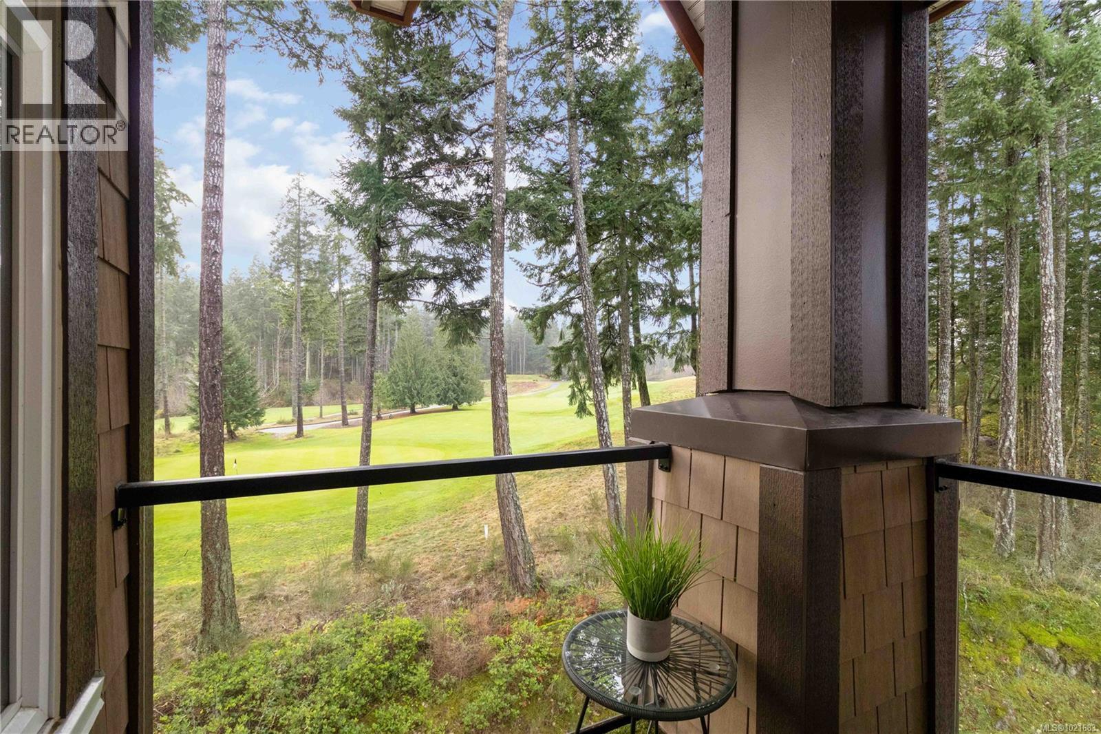 420 1395 Bear Mountain Pkwy, Langford, BC - Indoor Photo Showing Living Room With Fireplace