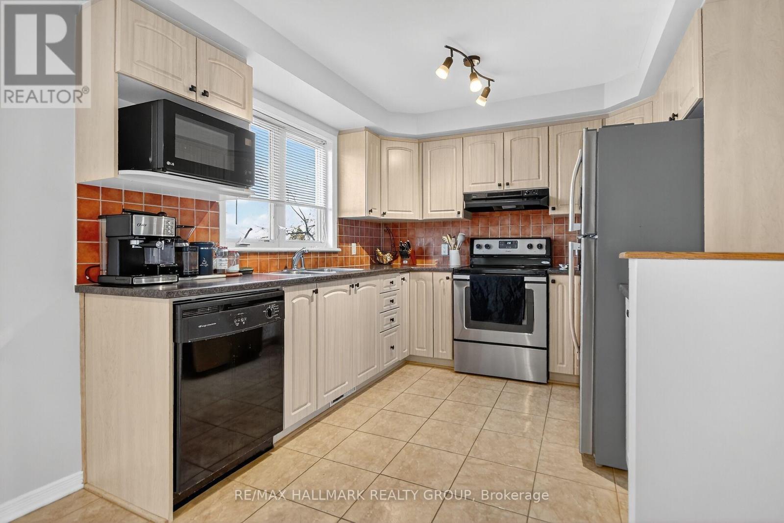 104 - 1512 Walkley Road, Ottawa, ON - Indoor Photo Showing Kitchen With Double Sink