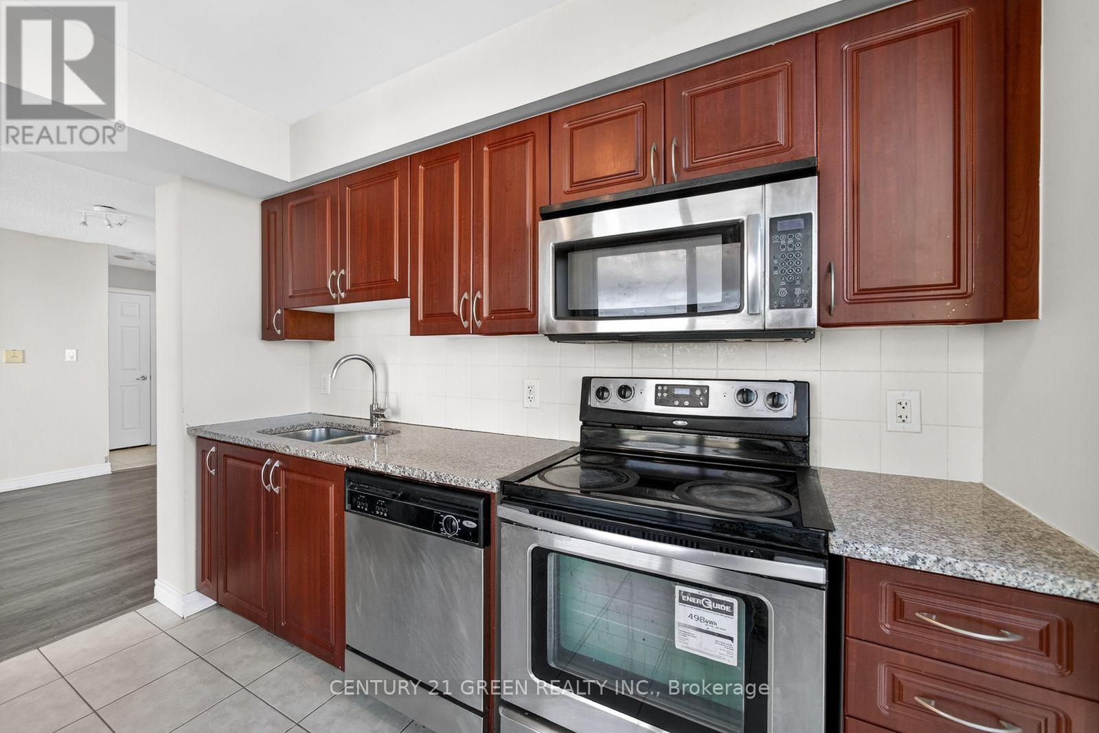 2909 - 208 Enfield Place, Mississauga, ON - Indoor Photo Showing Kitchen With Stainless Steel Kitchen With Double Sink