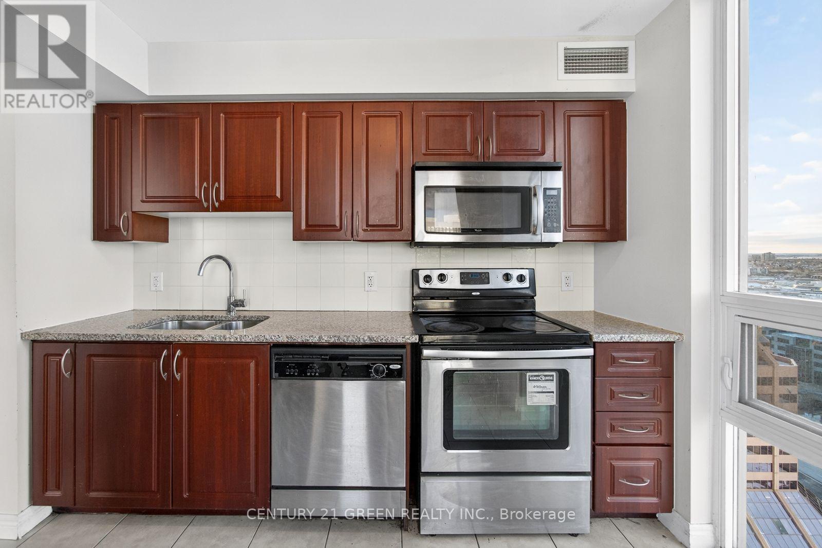 2909 - 208 Enfield Place, Mississauga, ON - Indoor Photo Showing Kitchen With Stainless Steel Kitchen With Double Sink