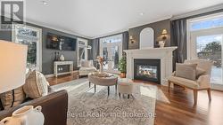 Living Room with 2-way Fireplace -