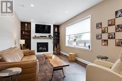 Fireplace propane insert and built-in shelves -