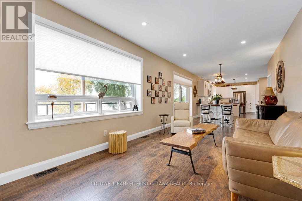 Panoramic, mesmerizing river views - 38 Tuttle Point Road, Edwardsburgh/Cardinal, ON - Indoor Photo Showing Living Room