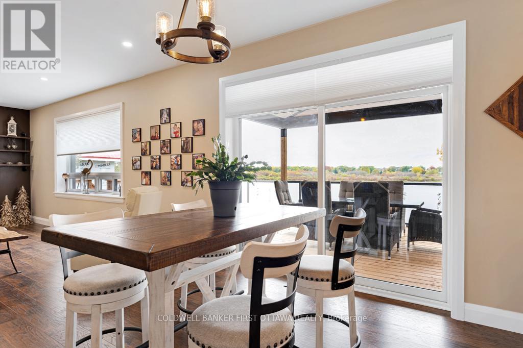 Dining area patio doors - 38 Tuttle Point Road, Edwardsburgh/Cardinal, ON - Indoor Photo Showing Dining Room