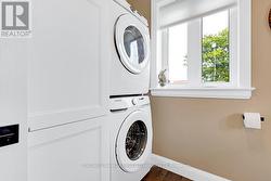 Powder room includes laundry station -
