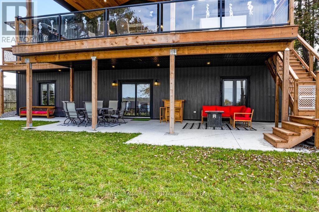 Lower level covered patio - 38 Tuttle Point Road, Edwardsburgh/Cardinal, ON - Outdoor With Deck Patio Veranda