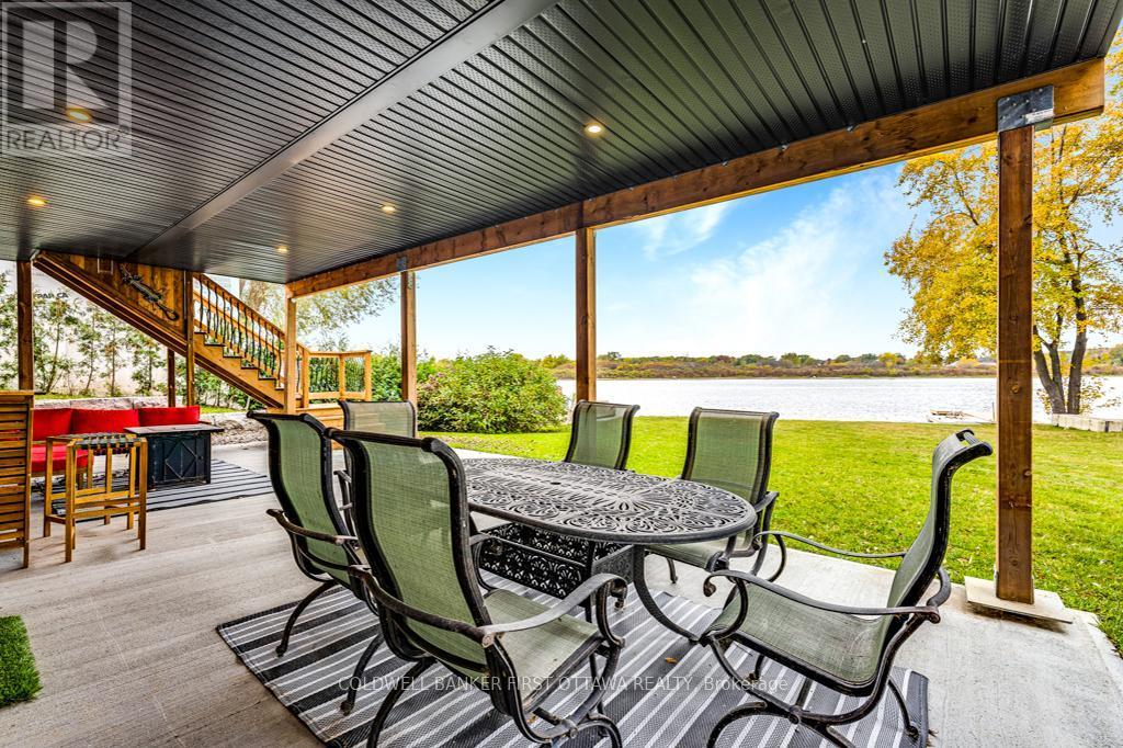 Scenic, tranquil, setting with spectacular views - 38 Tuttle Point Road, Edwardsburgh/Cardinal, ON - Outdoor With Deck Patio Veranda With Exterior