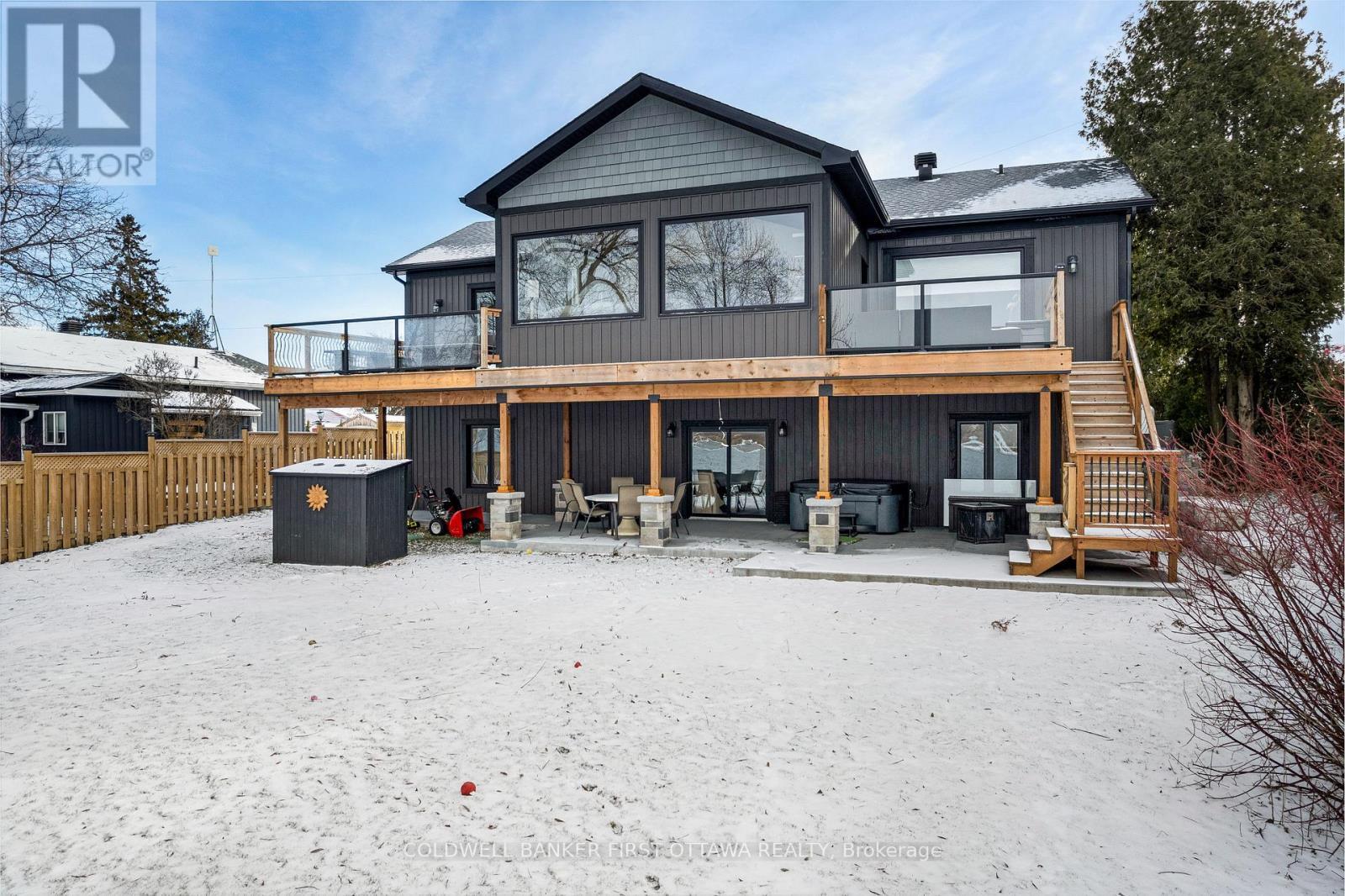 Home's sunroom, upper deck & walkout lower level - 38 Tuttle Point Road, Edwardsburgh/Cardinal, ON - Outdoor