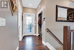 Front foyer etched glass door & double closet -