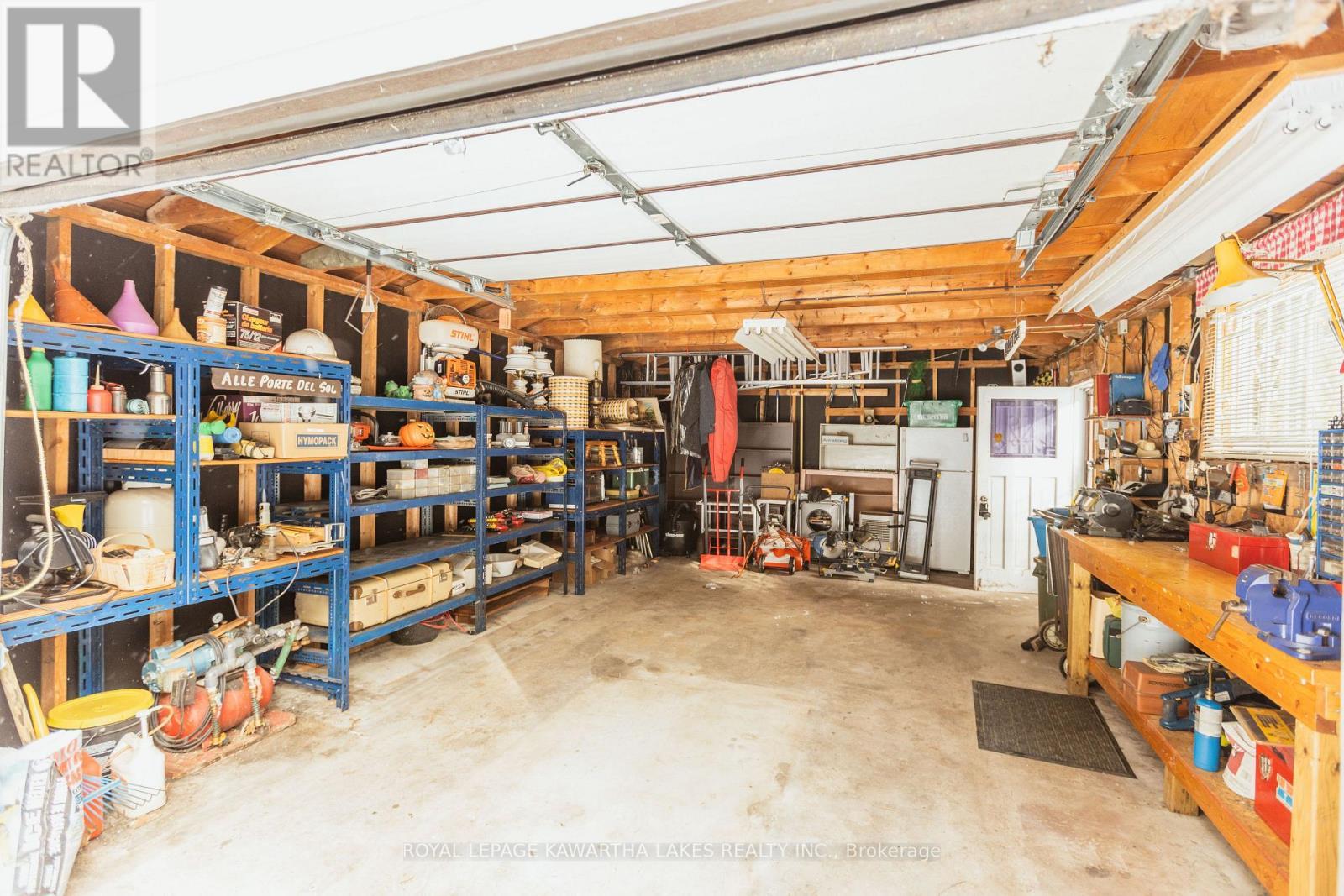 38 Fell Station Drive, Kawartha Lakes (Fenelon Falls), ON - Indoor Photo Showing Garage