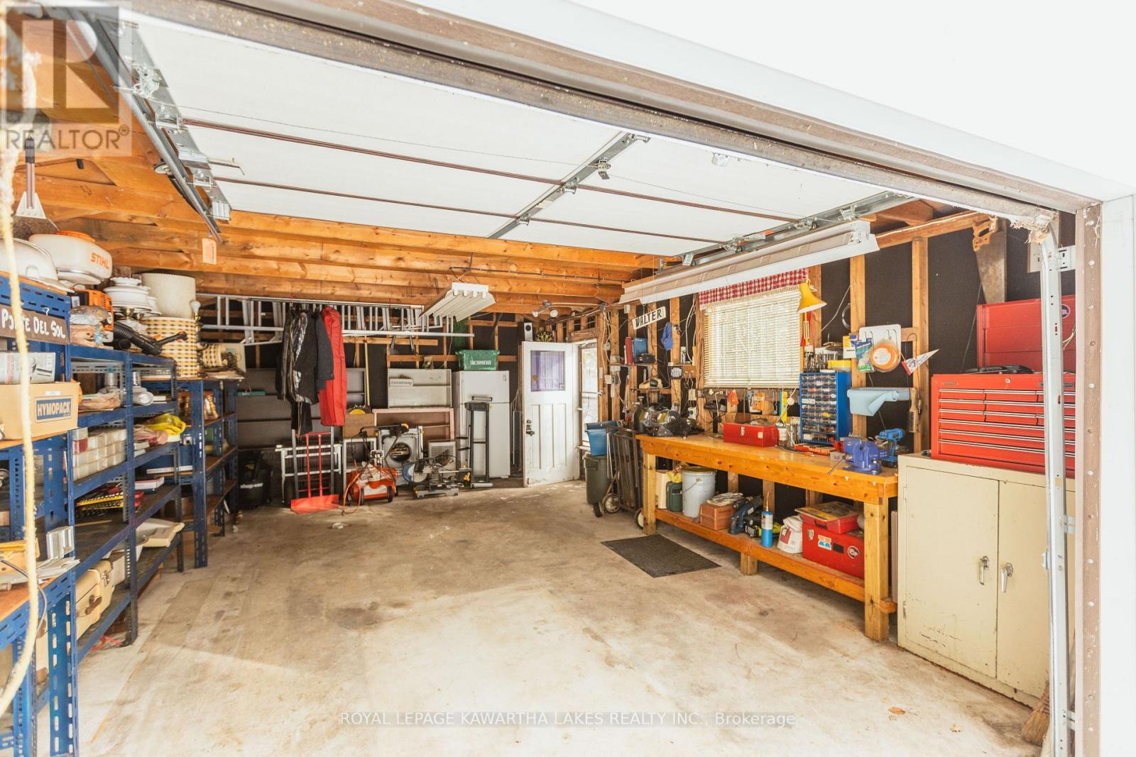 38 Fell Station Drive, Kawartha Lakes (Fenelon Falls), ON - Indoor Photo Showing Garage