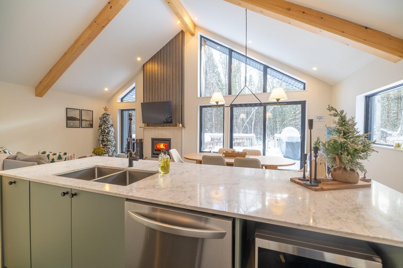 Aerial photo - 215 Ch. Des Chênes, Amherst, QC - Indoor Photo Showing Kitchen With Double Sink With Upgraded Kitchen