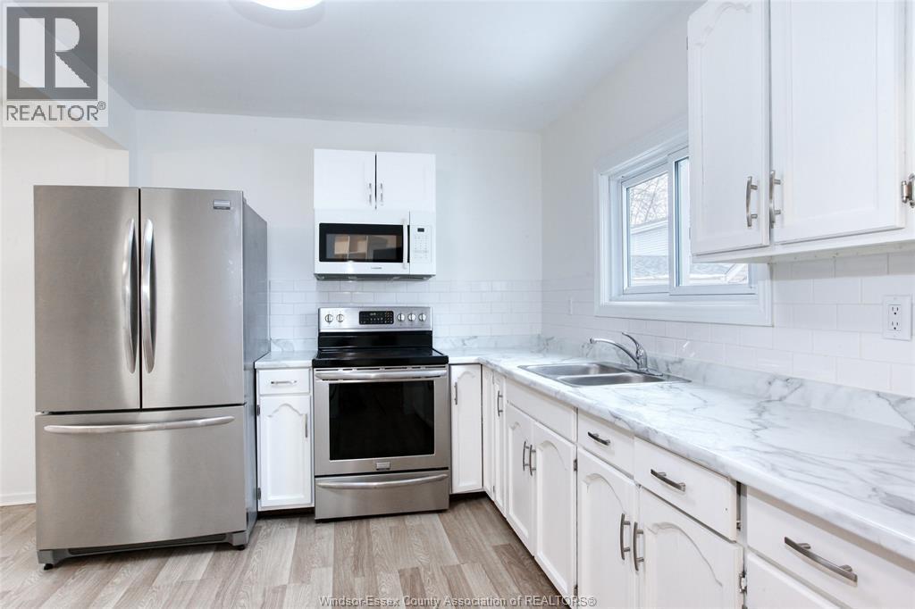 201 Gore, Amherstburg, ON - Indoor Photo Showing Kitchen With Double Sink