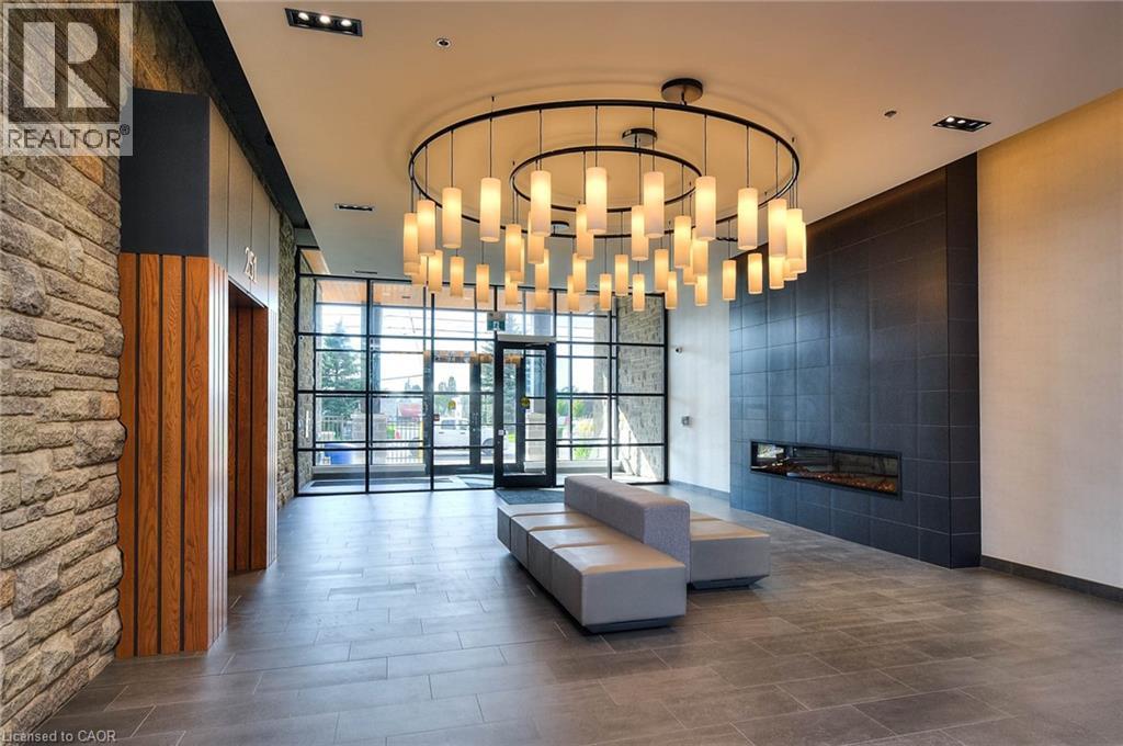 251 Northfield Drive Unit# 415B, Waterloo, ON - Indoor Photo Showing Other Room With Fireplace