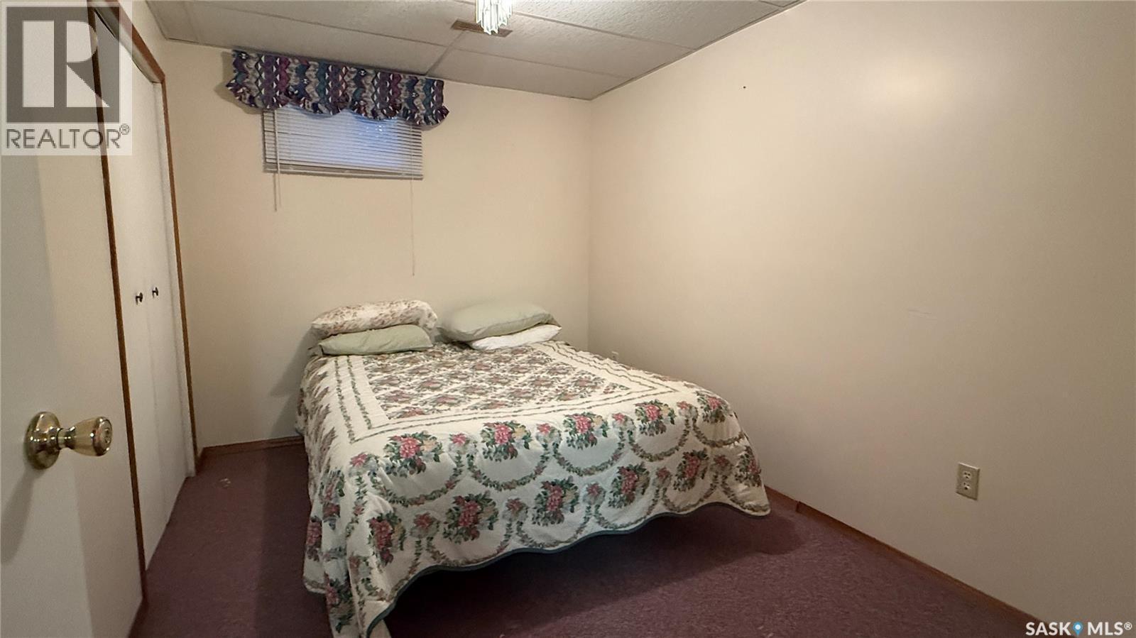 10326 Henderson Drive, North Battleford, SK - Indoor Photo Showing Bedroom