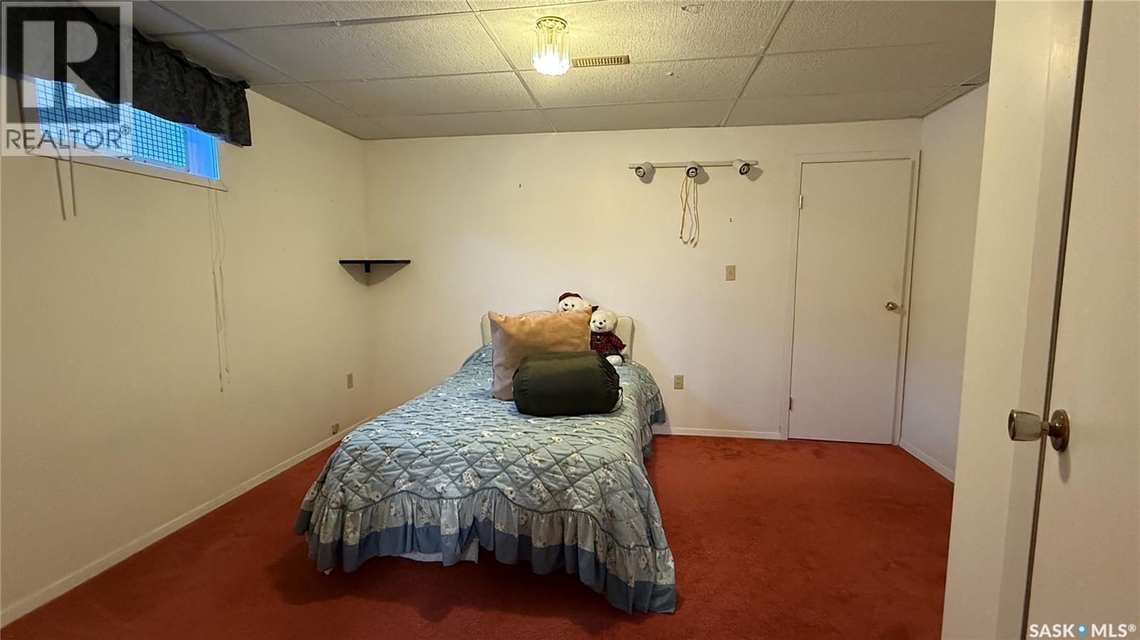 10326 Henderson Drive, North Battleford, SK - Indoor Photo Showing Bedroom