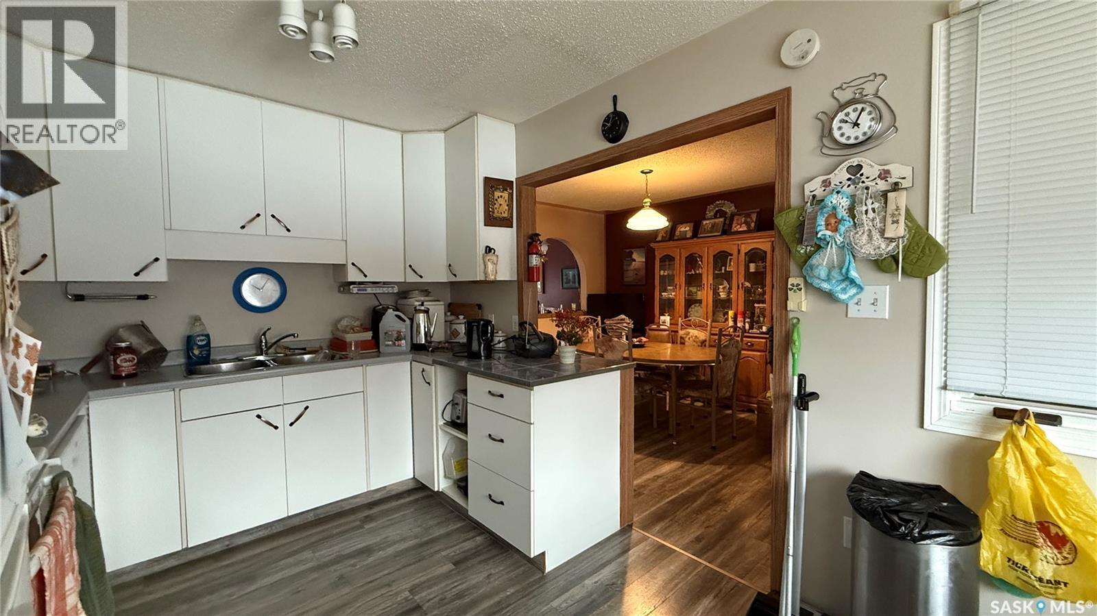 10326 Henderson Drive, North Battleford, SK - Indoor Photo Showing Kitchen With Double Sink