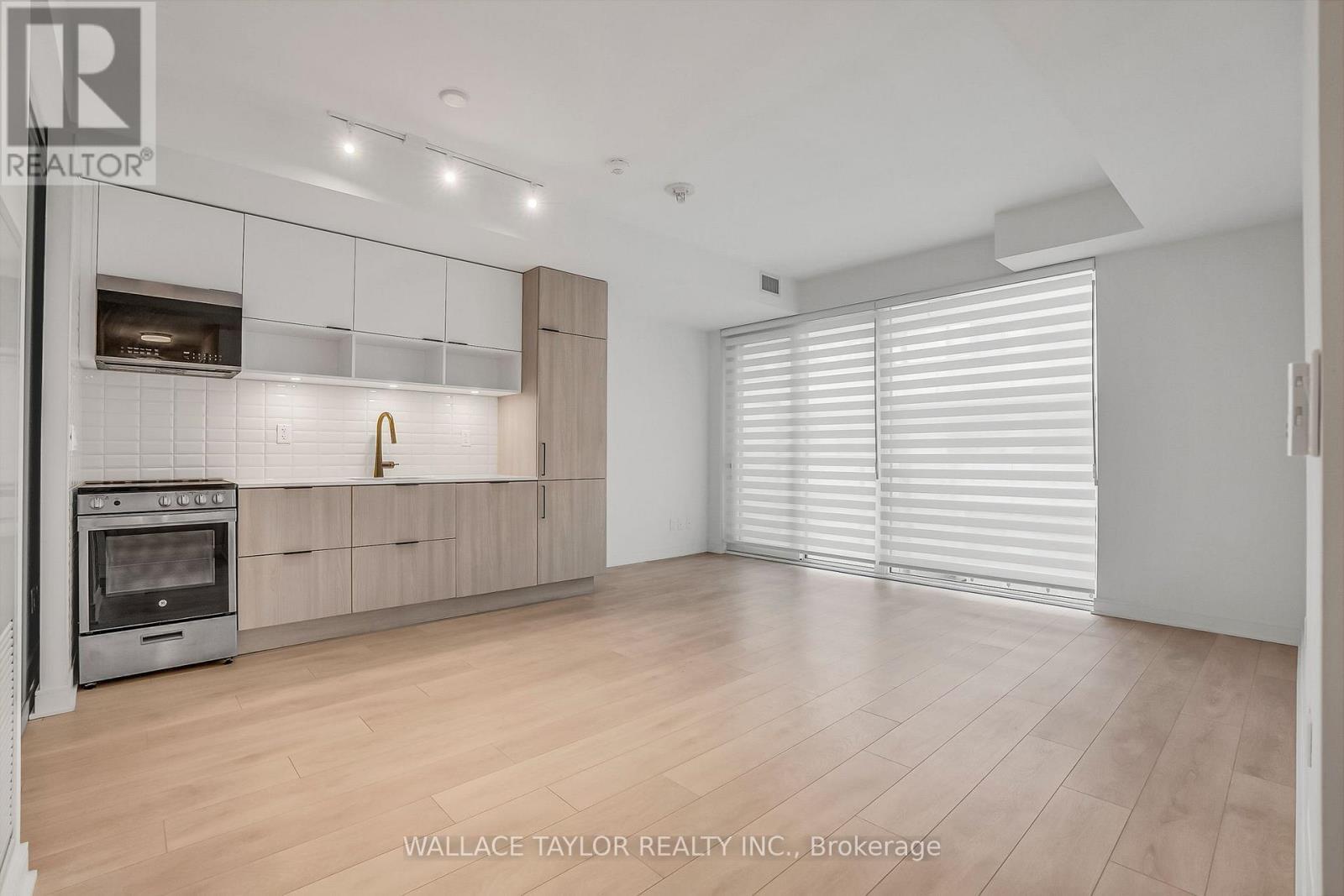 Kitchen / Living / Dining - 12 - 35 Rolling Mills Road, Toronto, ON - Indoor Photo Showing Kitchen