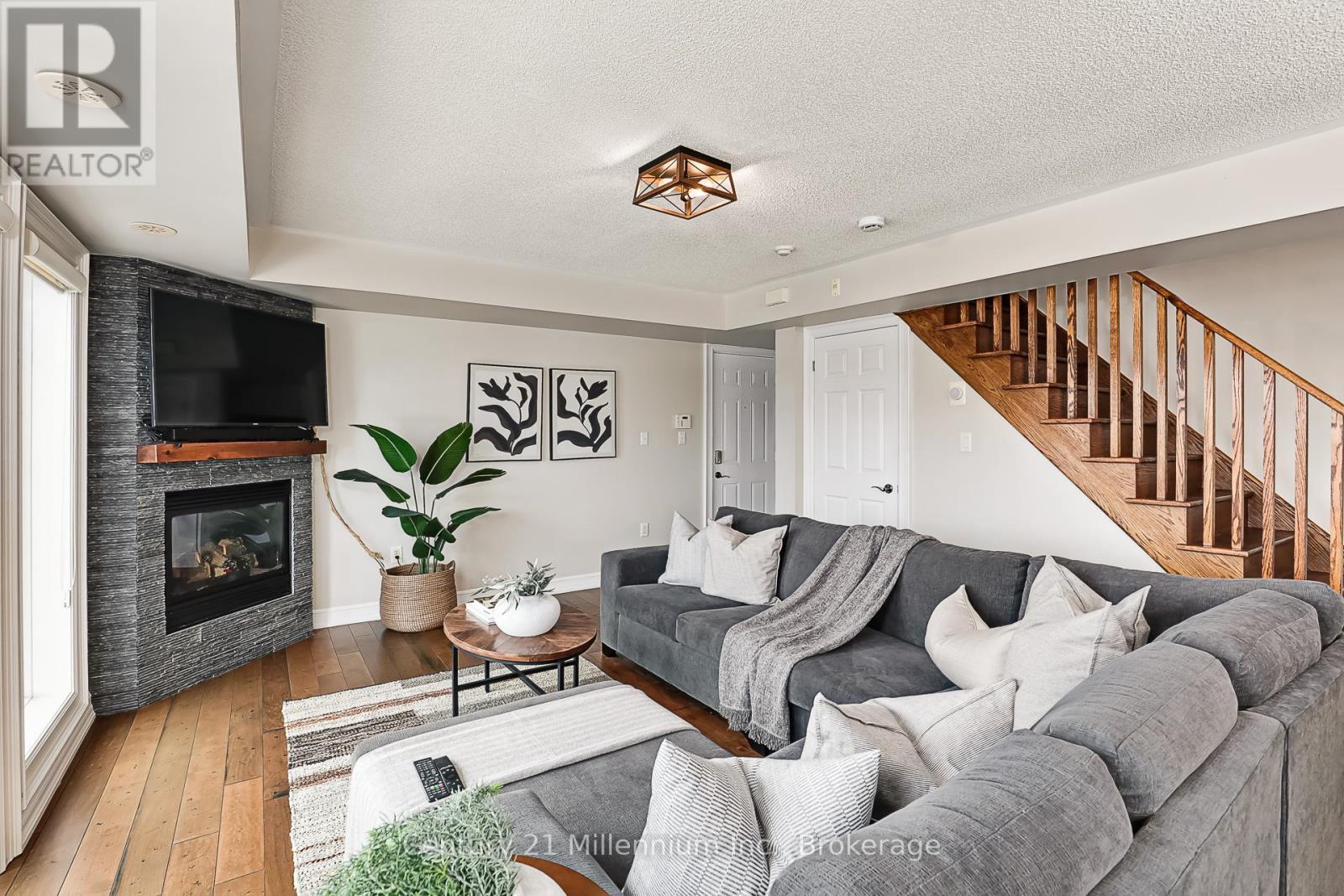 201 - 6 Joseph Trail, Collingwood, ON - Indoor Photo Showing Living Room With Fireplace