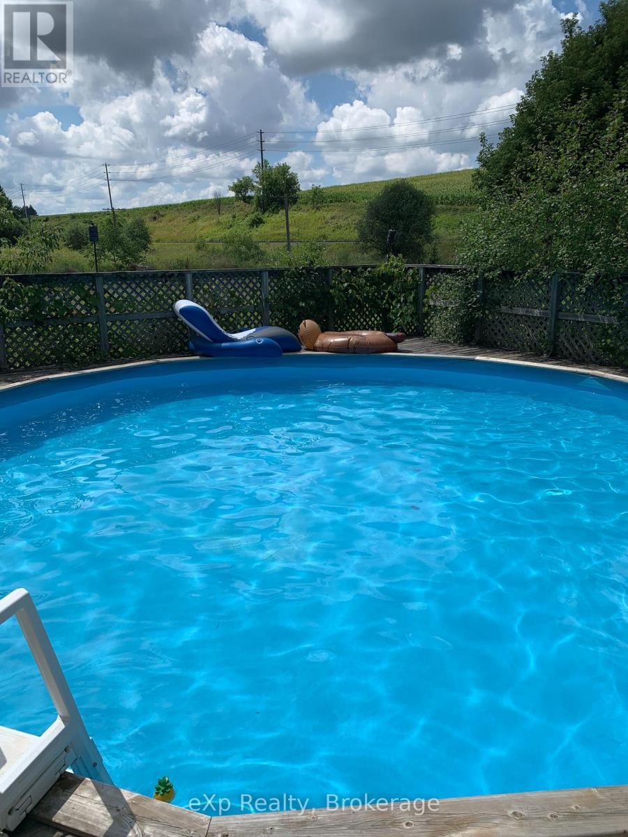 7922 Hwy 7 Highway, Guelph/Eramosa, ON - Outdoor With Above Ground Pool