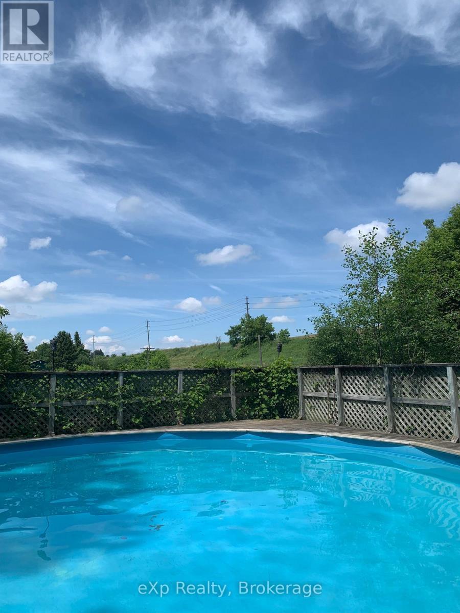 7922 Hwy 7 Highway, Guelph/Eramosa, ON - Outdoor With Above Ground Pool