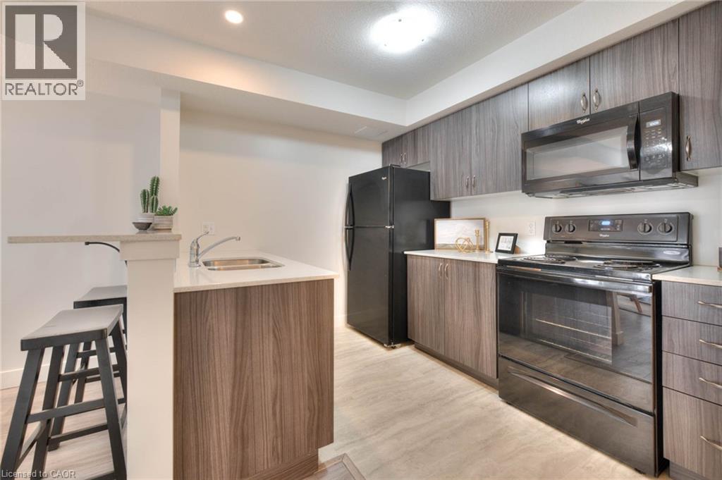 361 Lancaster Street W Unit# A14, Kitchener, ON - Indoor Photo Showing Kitchen With Double Sink
