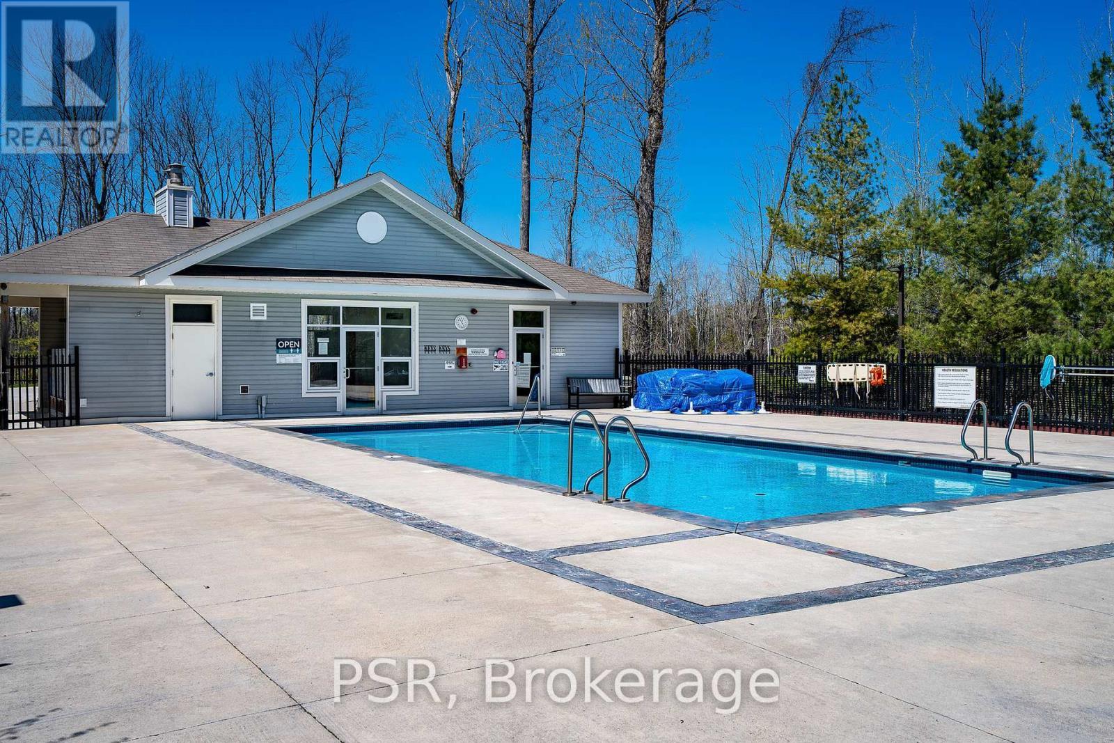 204 - 8 Brandy Lane Drive, Collingwood, ON - Outdoor With In Ground Pool