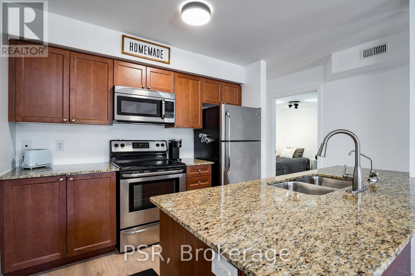 204 - 8 Brandy Lane Drive, Collingwood, ON - Indoor Photo Showing Kitchen With Double Sink
