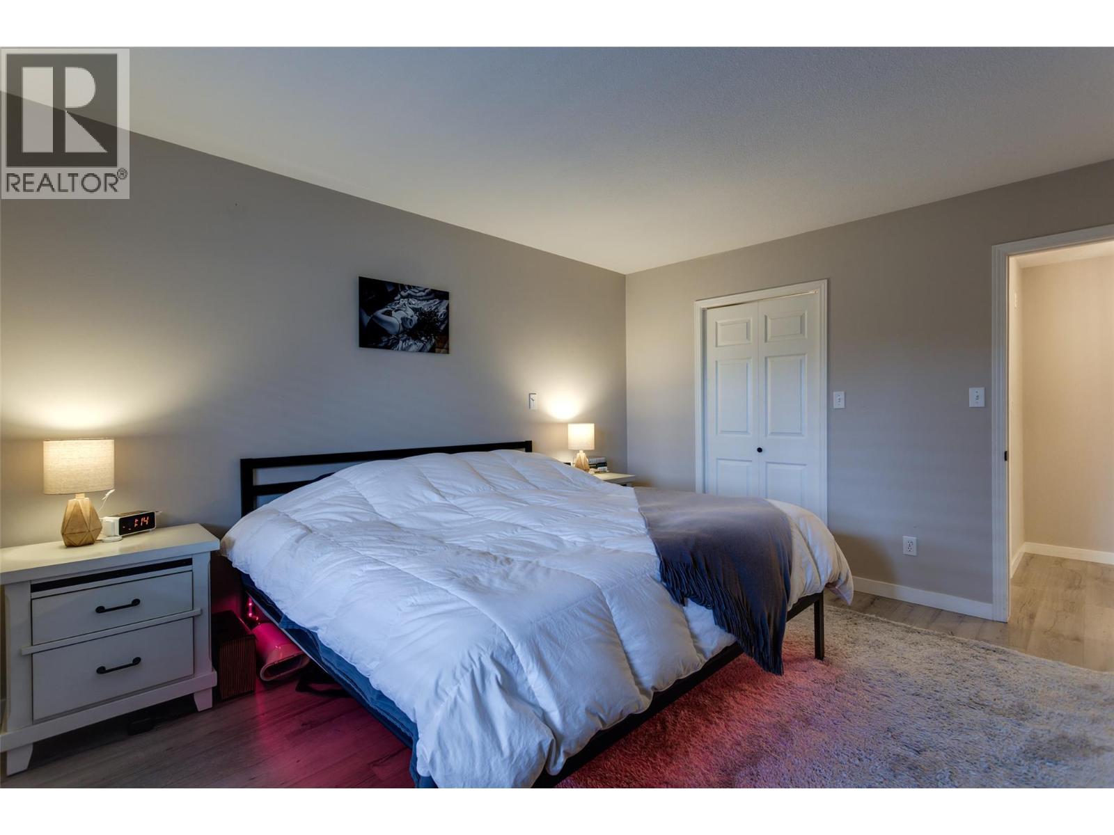400 Sutton Crescent Unit# 110, Kelowna, BC - Indoor Photo Showing Bedroom