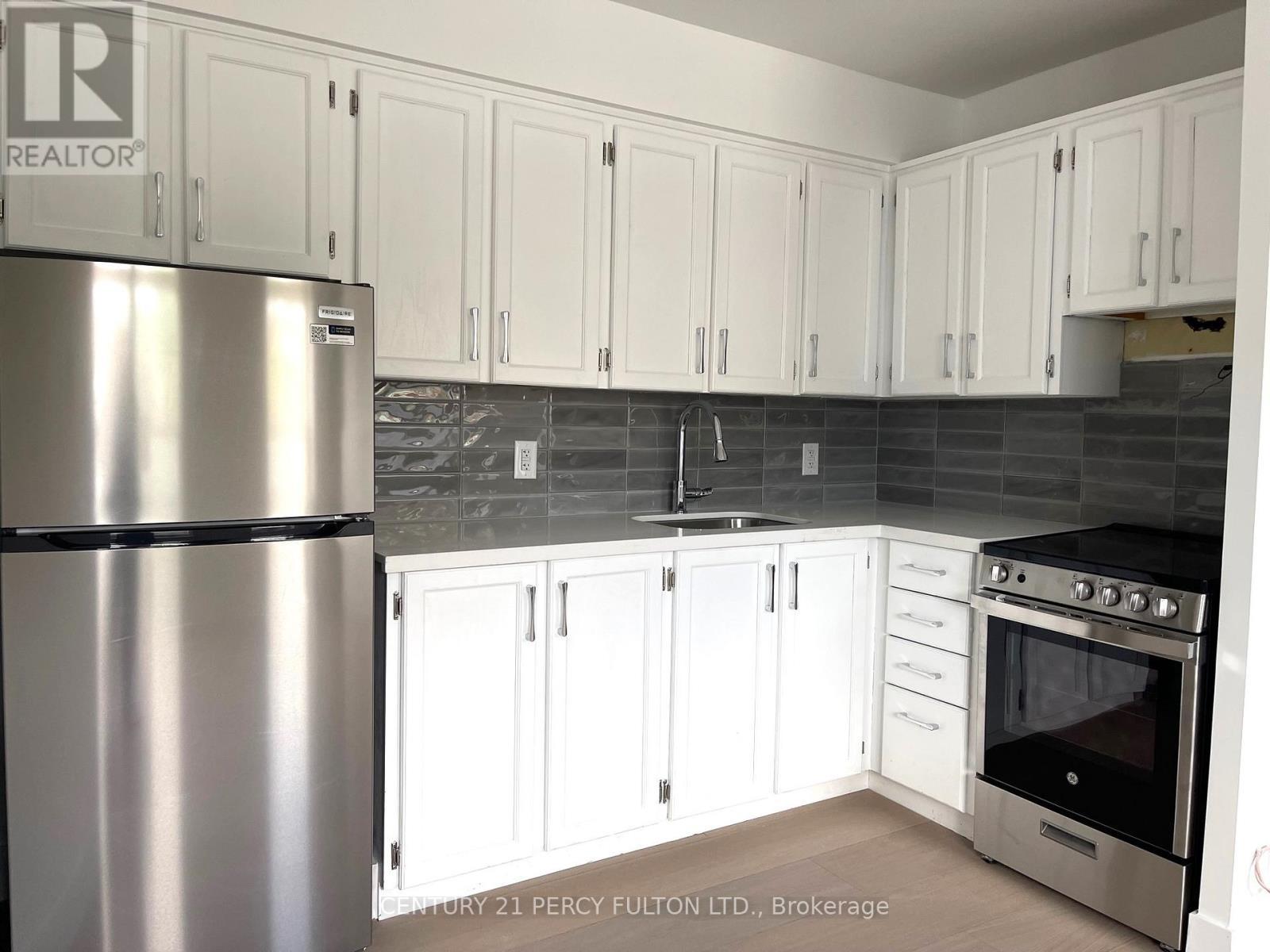 2 - 2373 Bloor Street W, Toronto, ON - Indoor Photo Showing Kitchen With Stainless Steel Kitchen With Upgraded Kitchen