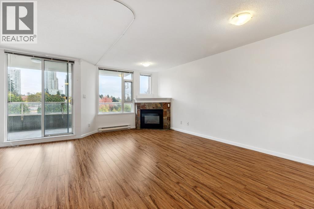 605 7108 Edmonds Street, Burnaby, BC - Indoor Photo Showing Living Room With Fireplace